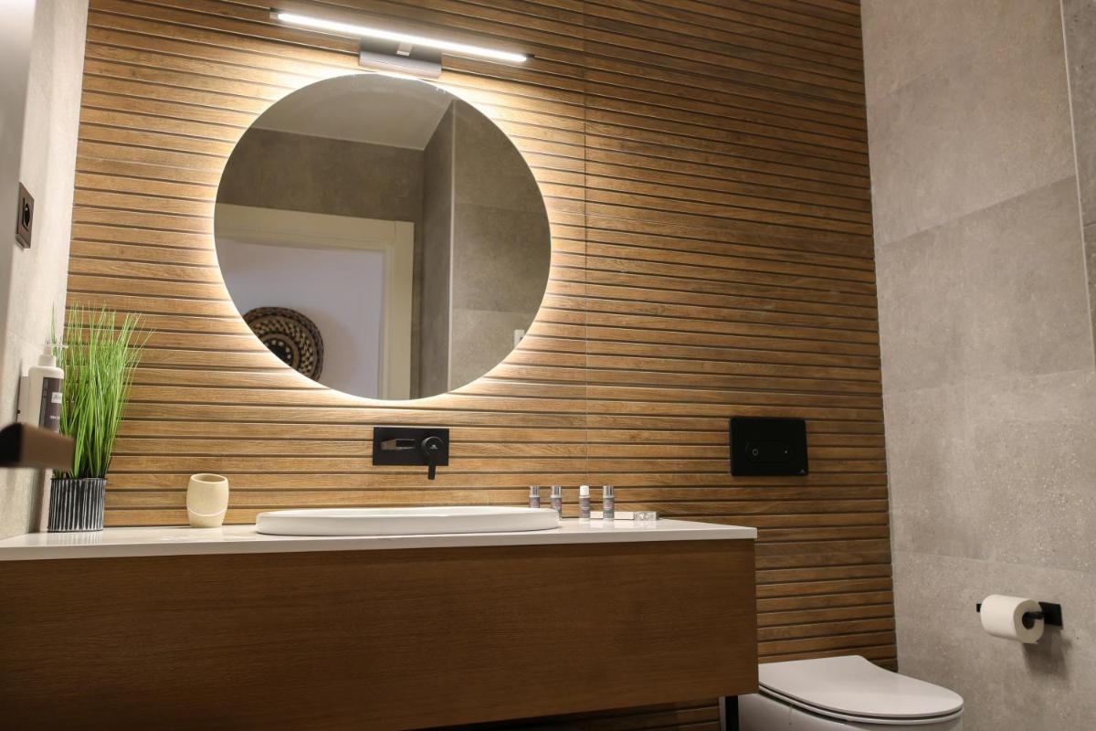 Salle de bains dans l'établissement Les Rêveries du Clos POMMARD Vignes & SPA& Dégustation