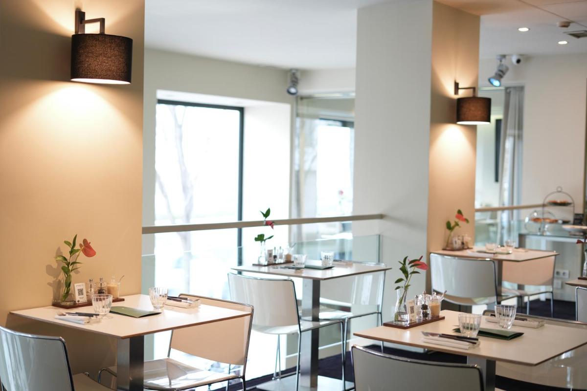 Un restaurante o sitio para comer en Hotel Miró