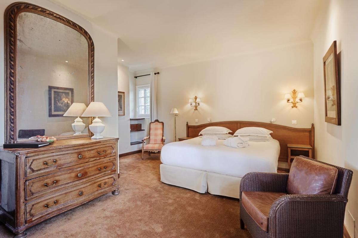 Un ou plusieurs lits dans un hébergement de l'établissement La Bastide du Calalou Hotel & Spa, BW Signature Collection