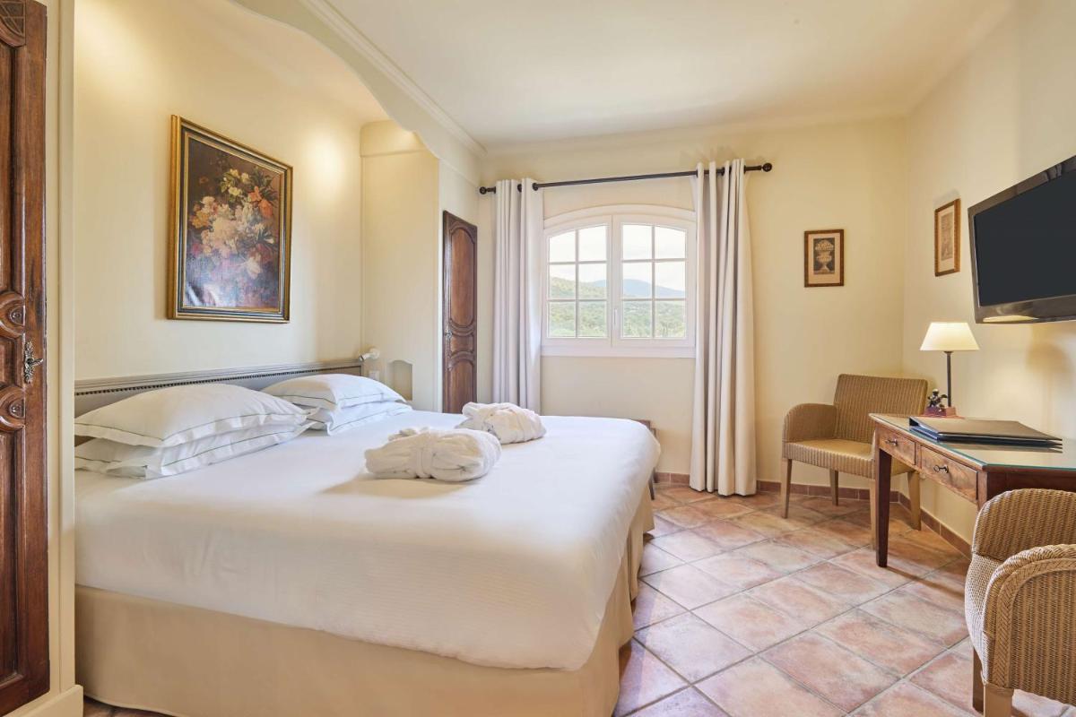 Un ou plusieurs lits dans un hébergement de l'établissement La Bastide du Calalou Hotel & Spa, BW Signature Collection