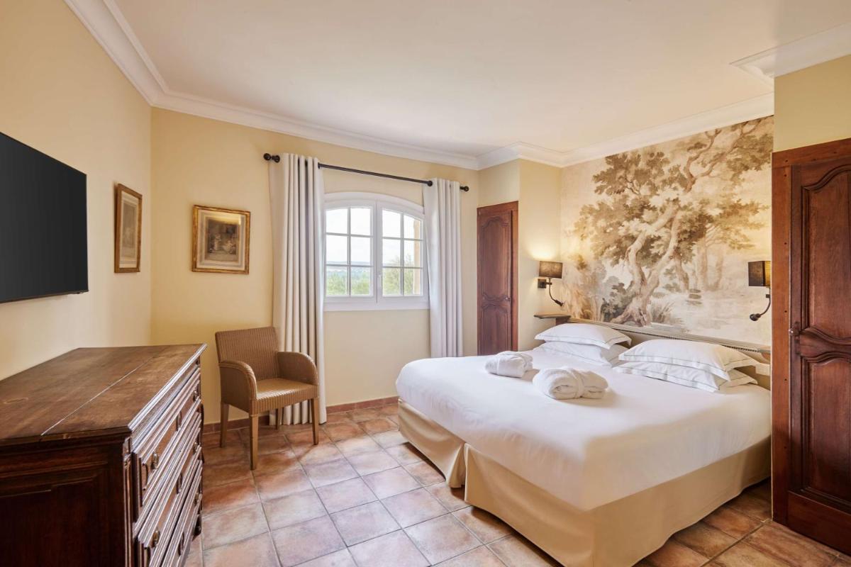 Un ou plusieurs lits dans un hébergement de l'établissement La Bastide du Calalou Hotel & Spa, BW Signature Collection