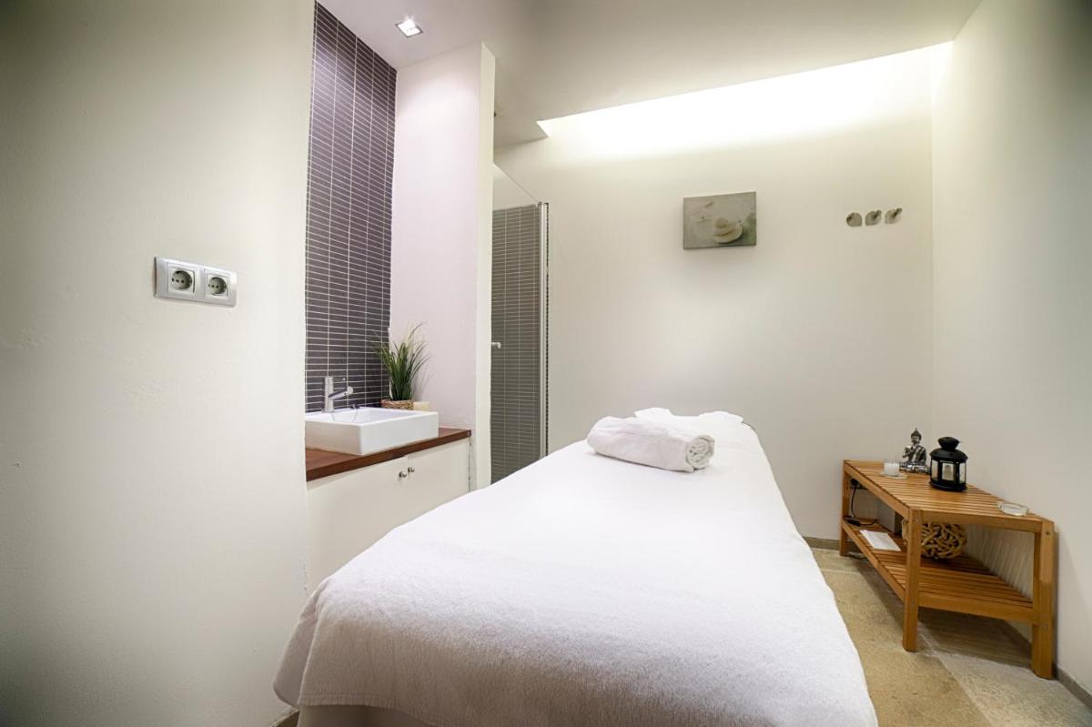 Cama o camas de una habitación en Ohtels Les Oliveres