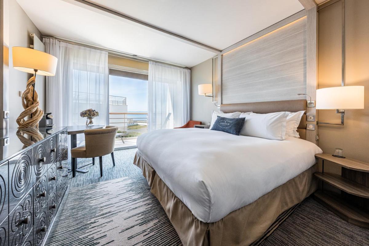 Un ou plusieurs lits dans un hébergement de l'établissement Sofitel Quiberon Thalassa sea & spa