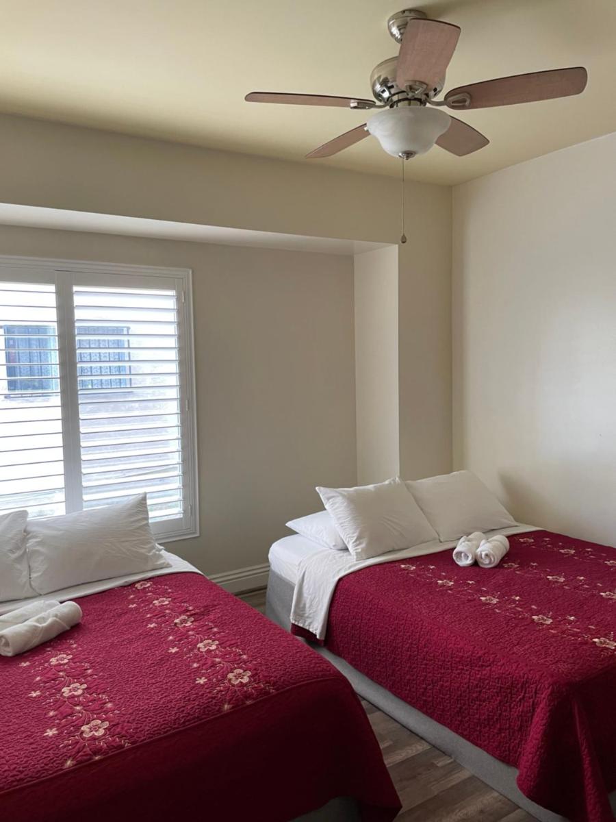Spacious Private Los Angeles Bedroom with AC & WIFI & Private Fridge near USC the Coliseum Exposition Park BMO Stadium University of Southern California - Housity