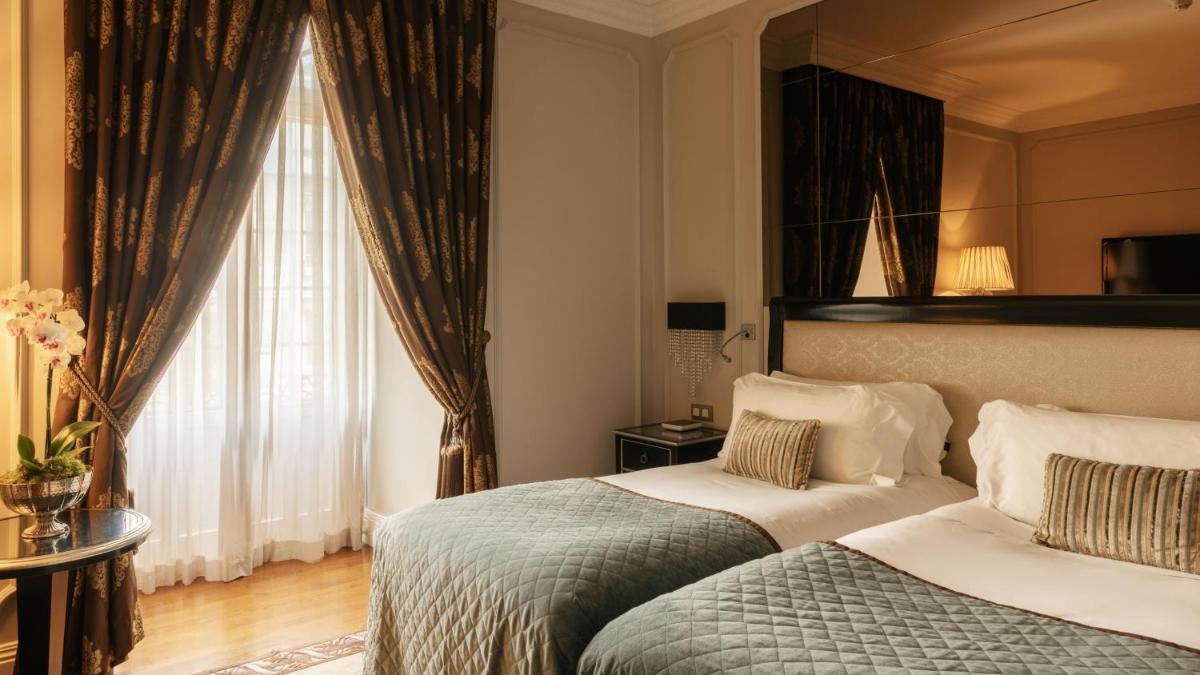 Uma cama ou camas num quarto em InterContinental Porto - Palacio das Cardosas by IHG