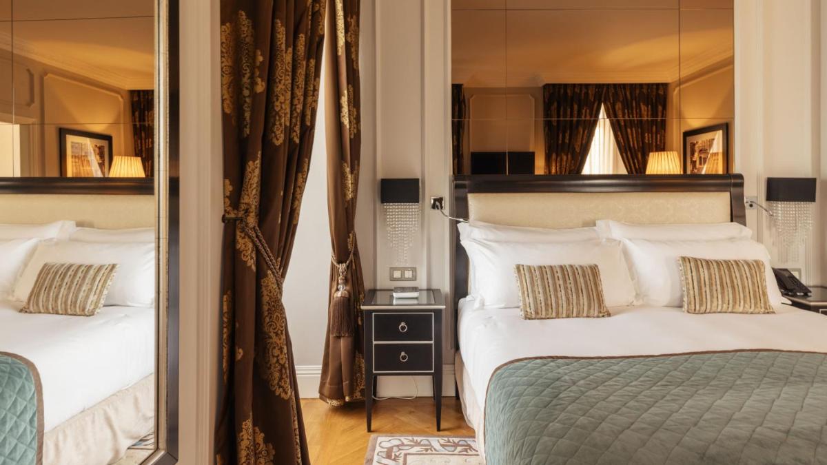 Uma cama ou camas num quarto em InterContinental Porto - Palacio das Cardosas by IHG