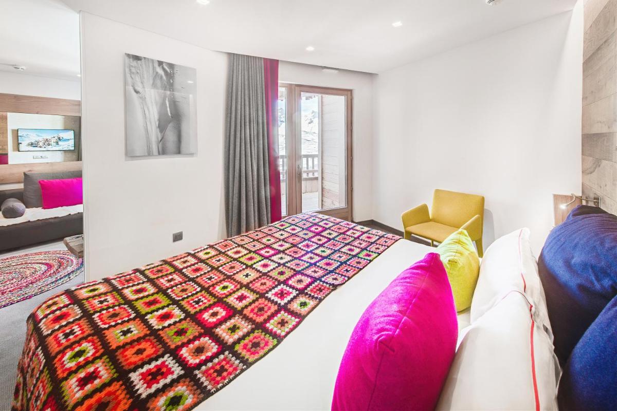 Un ou plusieurs lits dans un hébergement de l'établissement Hotel Pashmina Le Refuge