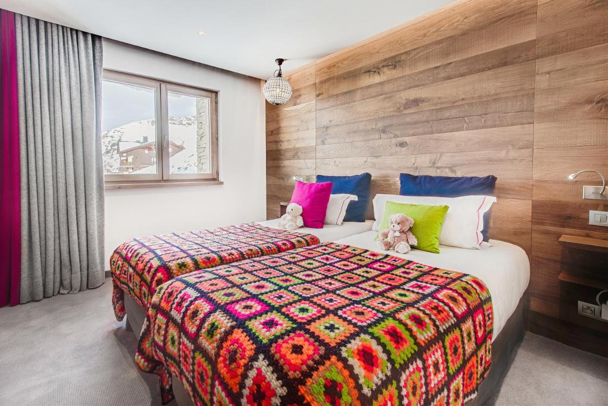 Un ou plusieurs lits dans un hébergement de l'établissement Hotel Pashmina Le Refuge