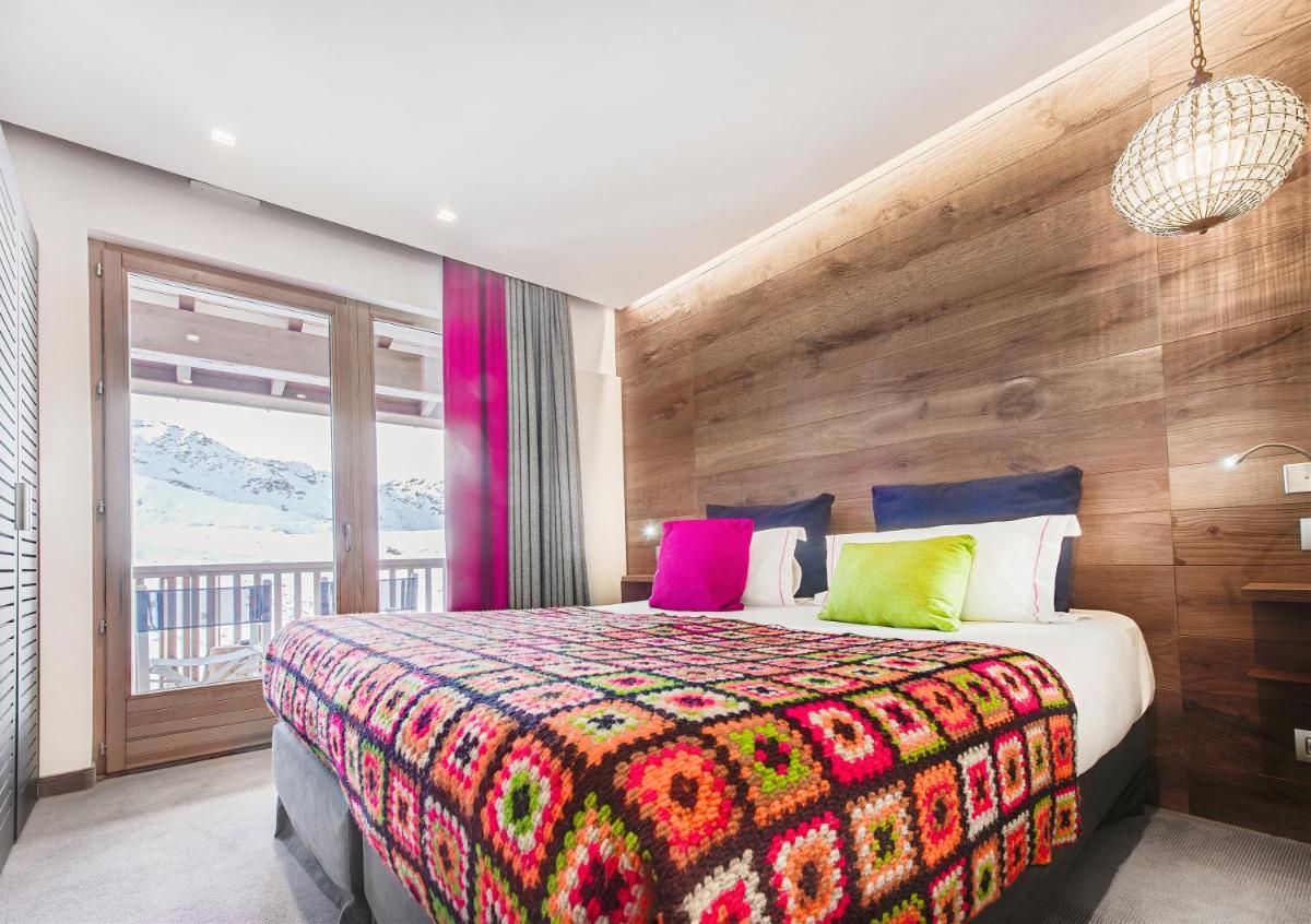 Un ou plusieurs lits dans un hébergement de l'établissement Hotel Pashmina Le Refuge
