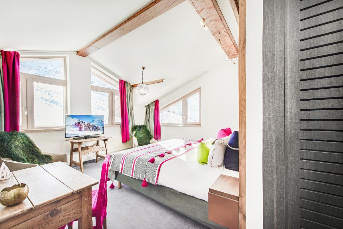 Un ou plusieurs lits dans un hébergement de l'établissement Hotel Pashmina Le Refuge