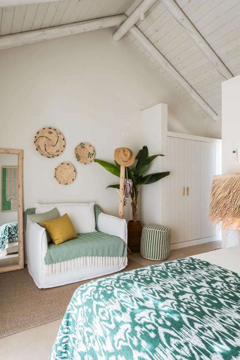 Uma cama ou camas num quarto em Independente Comporta