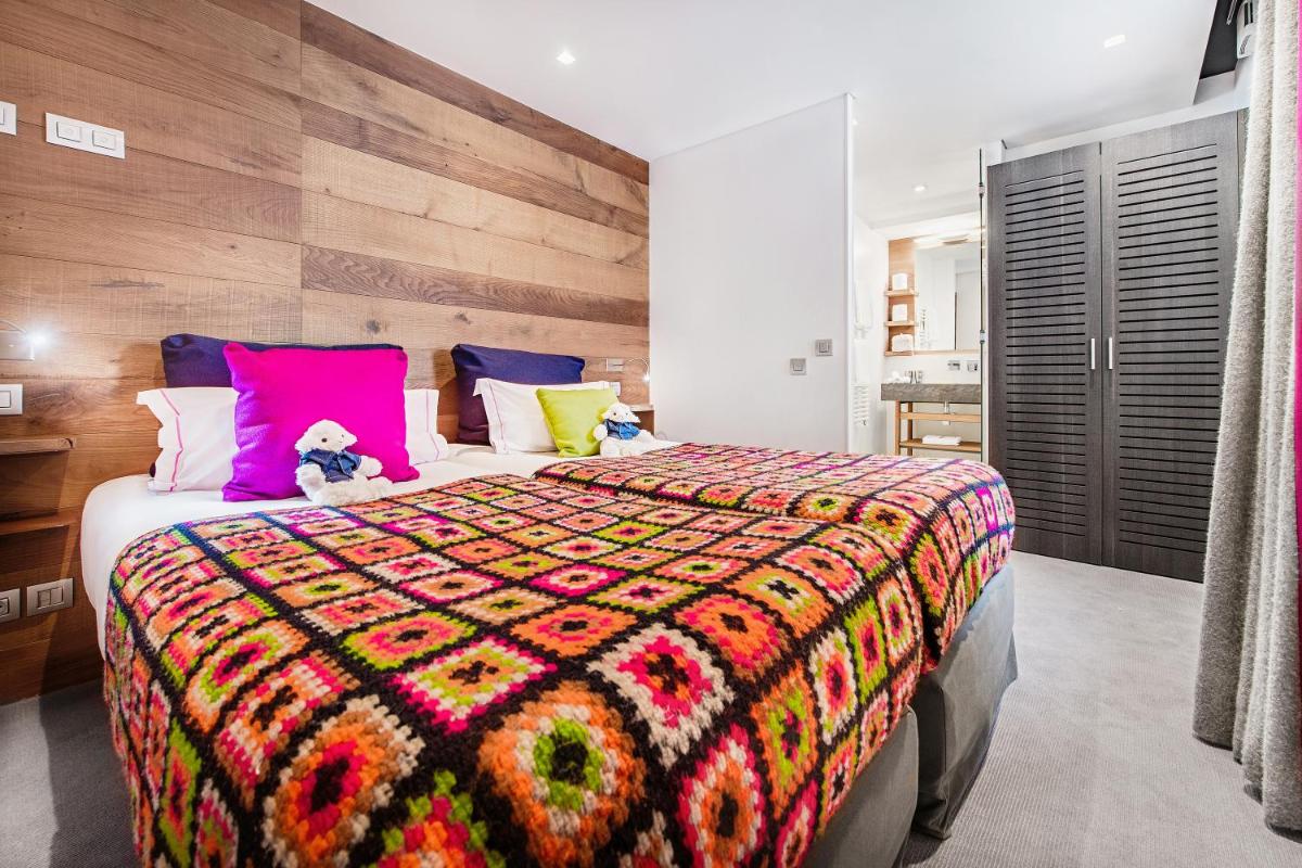 Un ou plusieurs lits dans un hébergement de l'établissement Hotel Pashmina Le Refuge
