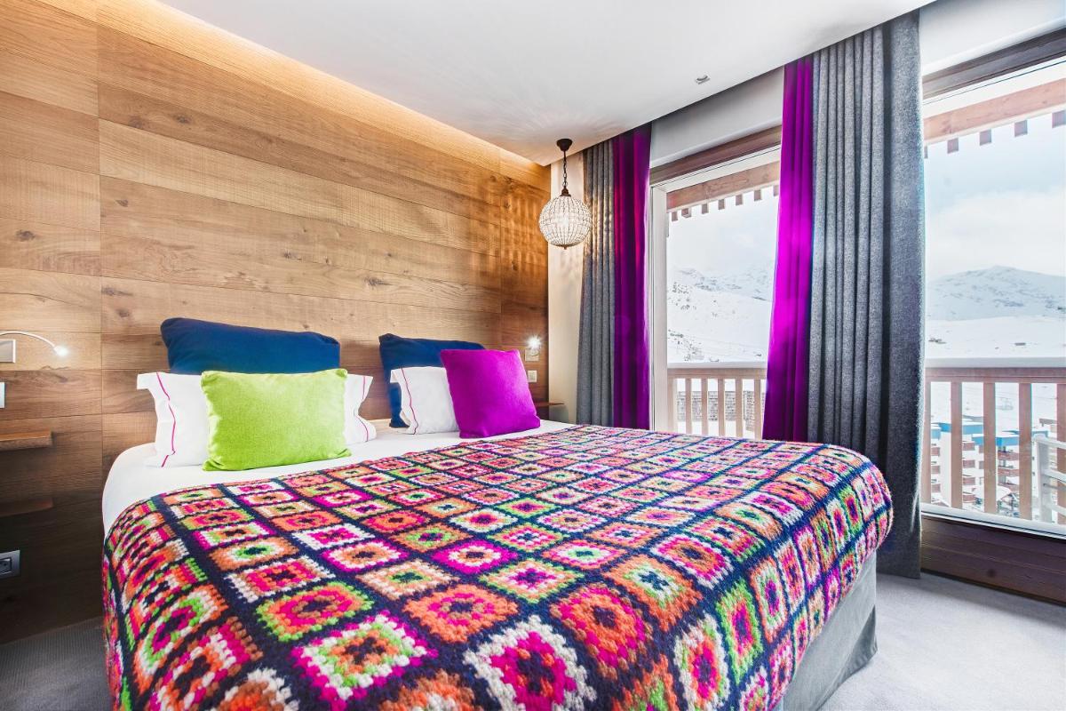 Un ou plusieurs lits dans un hébergement de l'établissement Hotel Pashmina Le Refuge