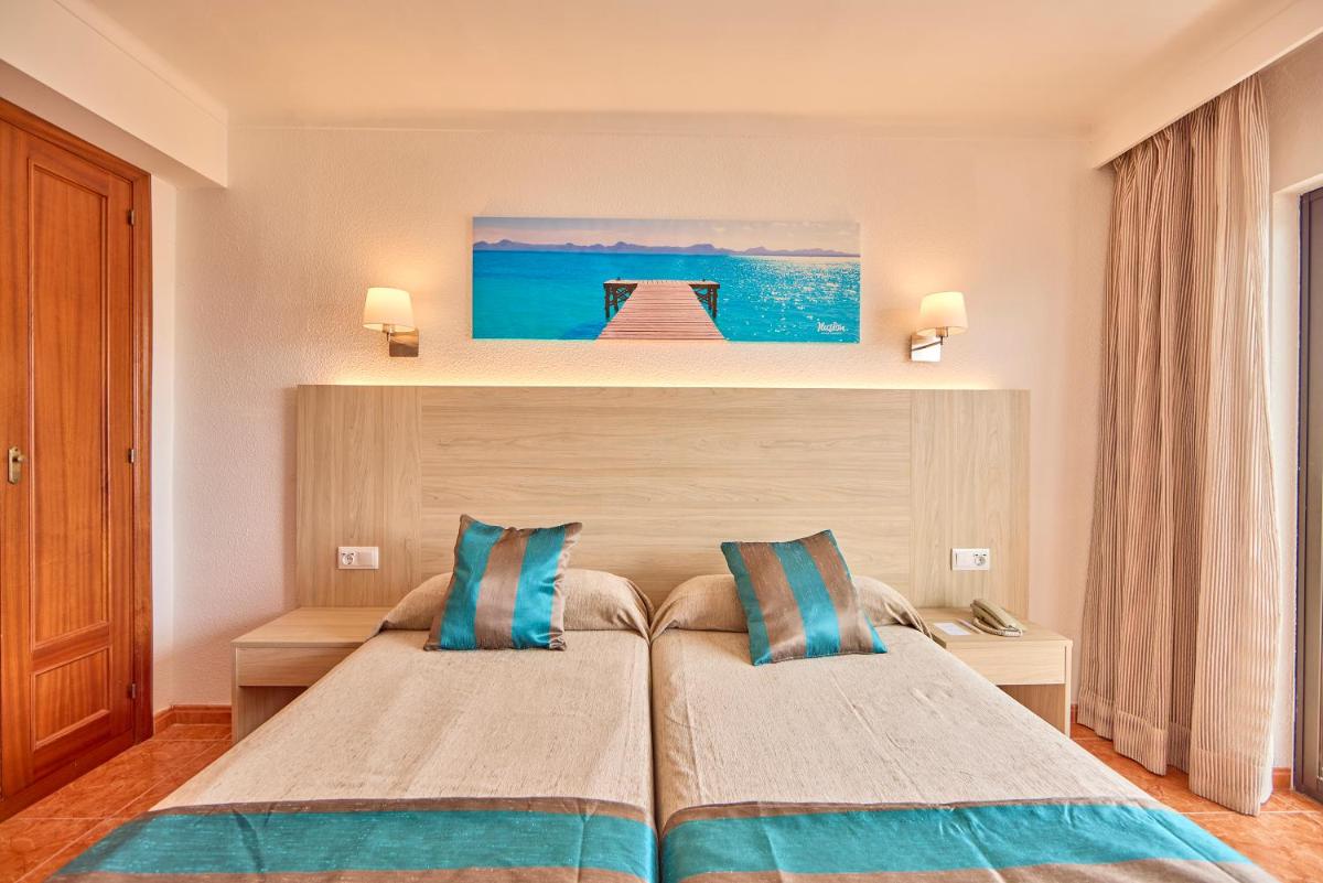 Cama o camas de una habitación en Ilusion Markus & Spa