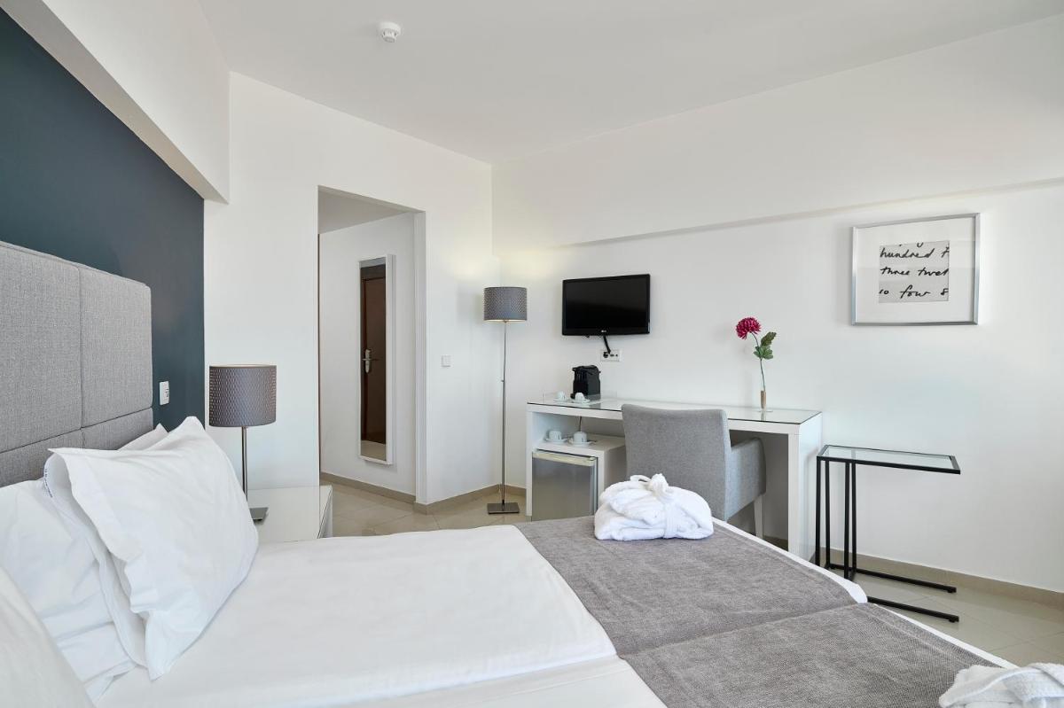 Uma cama ou camas num quarto em Rocamar Exclusive Hotel & Spa - Adults Only