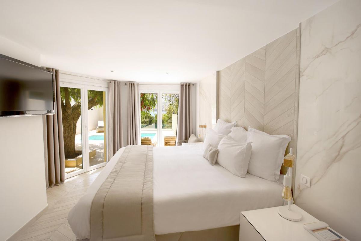 Un ou plusieurs lits dans un hébergement de l'établissement Hôtel Marinca & Spa