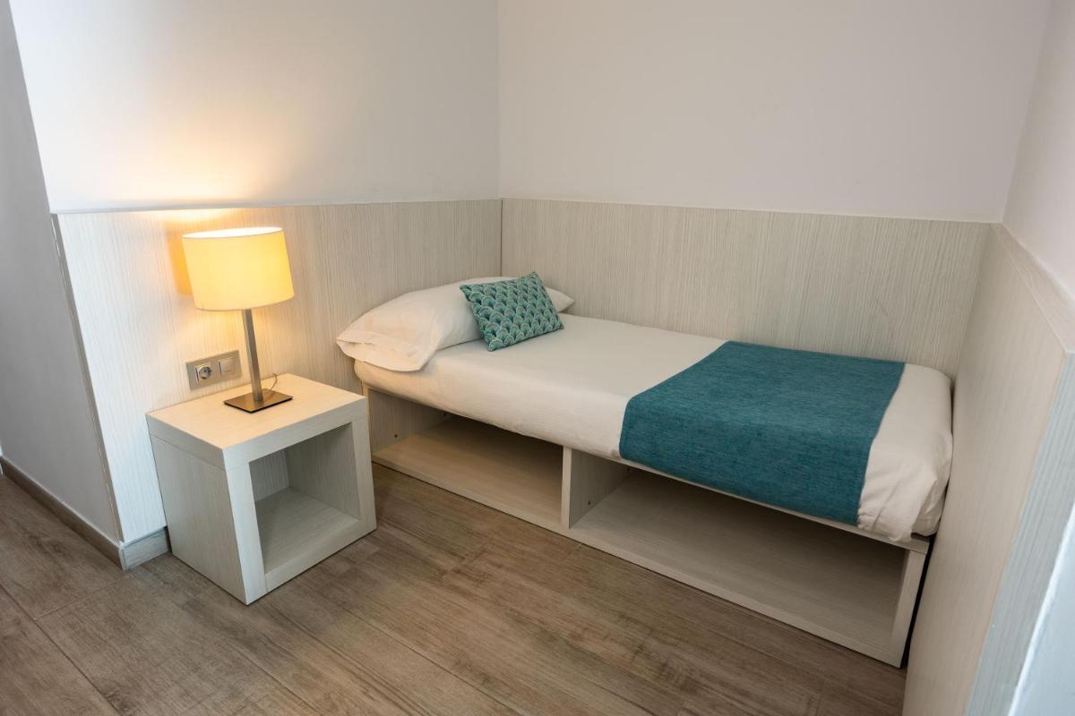 Cama o camas de una habitación en Ibiza Corso Hotel & Spa