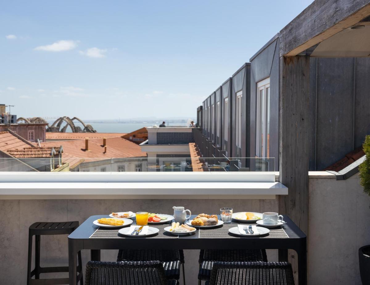 Uma varanda ou terraço em Lisboa Pessoa Hotel