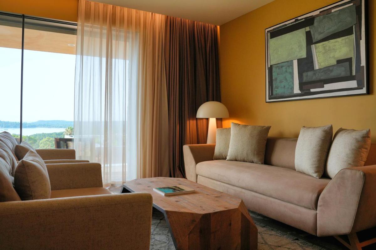 Coin salon dans l'établissement Les Regalia Hôtel & Spa