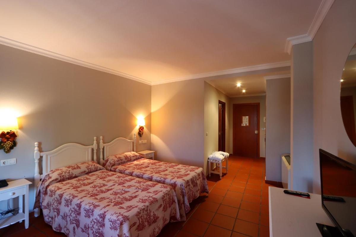 Cama o camas de una habitación en Hotel Varinia Serena - Balneario de Alange