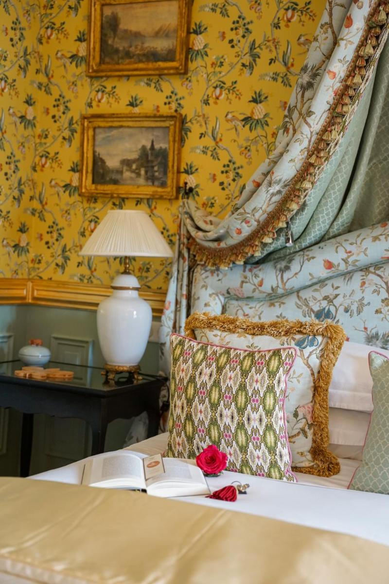 Un ou plusieurs lits dans un hébergement de l'établissement Villa Gallici Hôtel & Spa