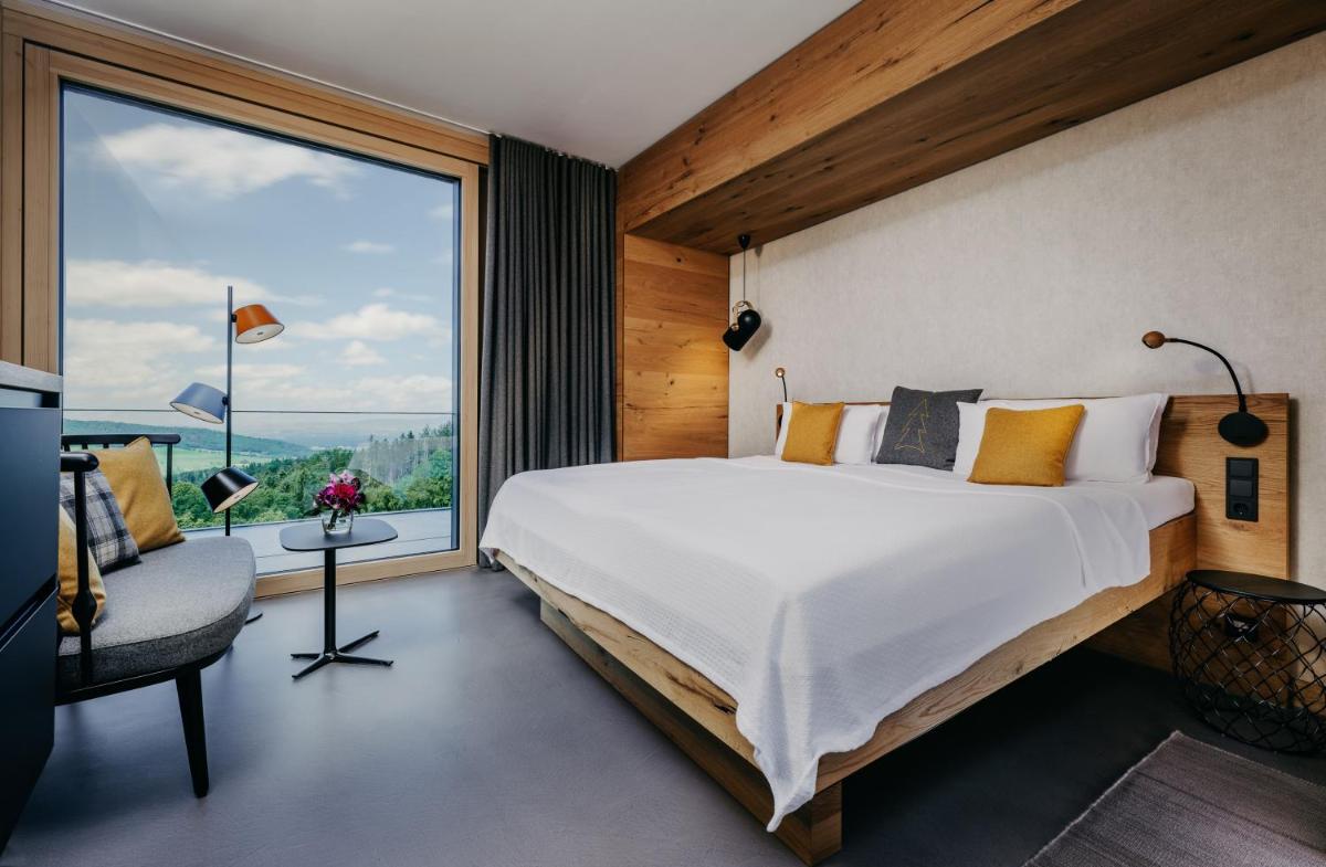Ein Bett oder Betten in einem Zimmer der Unterkunft Luisenhöhe - Gesundheitsresort Schwarzwald