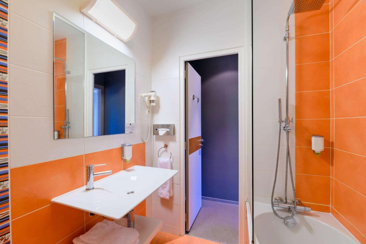 Salle de bains dans l'établissement The Originals Boutique, Hôtel La Marébaudière, Vannes
