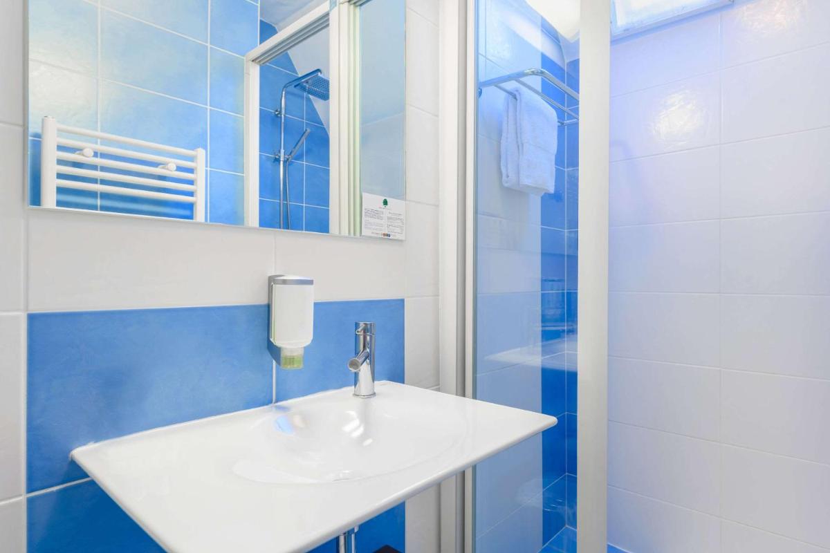Salle de bains dans l'établissement The Originals Boutique, Hôtel La Marébaudière, Vannes
