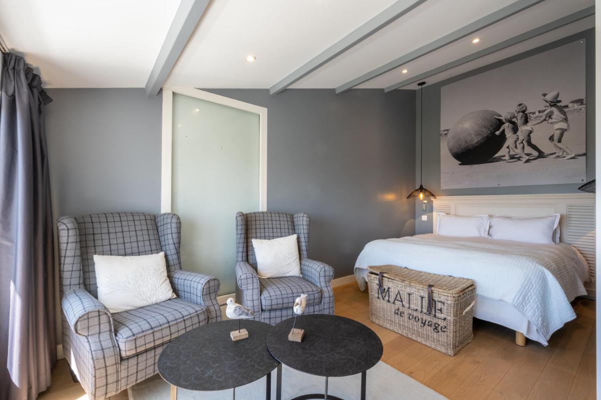 Un ou plusieurs lits dans un hébergement de l'établissement Hôtel Atalante - Relais Thalasso & Spa