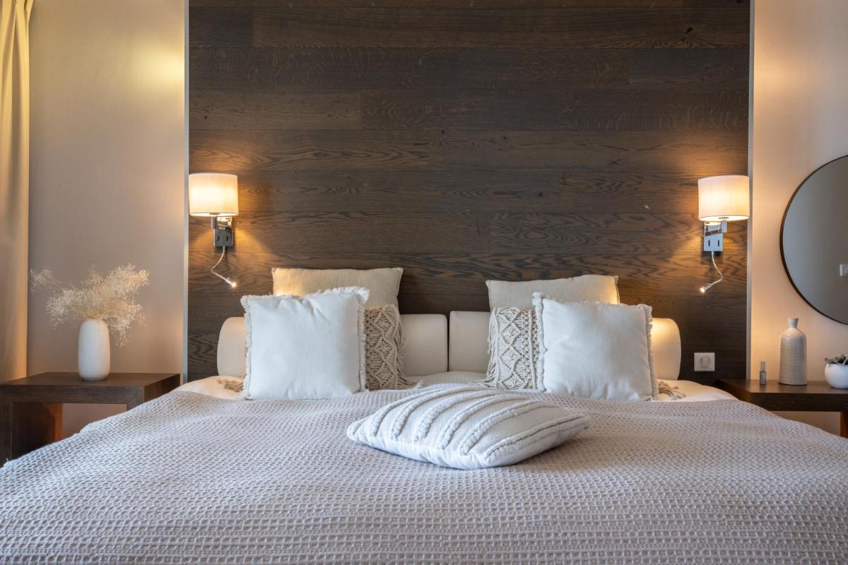 Un ou plusieurs lits dans un hébergement de l'établissement Hôtel Atalante - Relais Thalasso & Spa