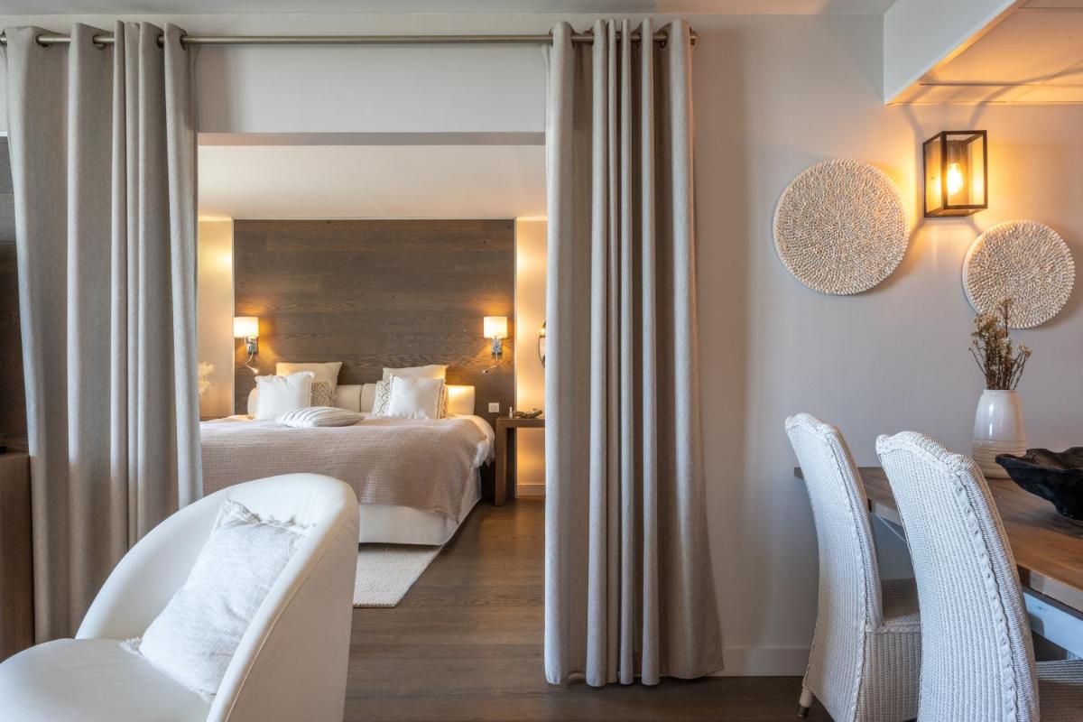 Un ou plusieurs lits dans un hébergement de l'établissement Hôtel Atalante - Relais Thalasso & Spa