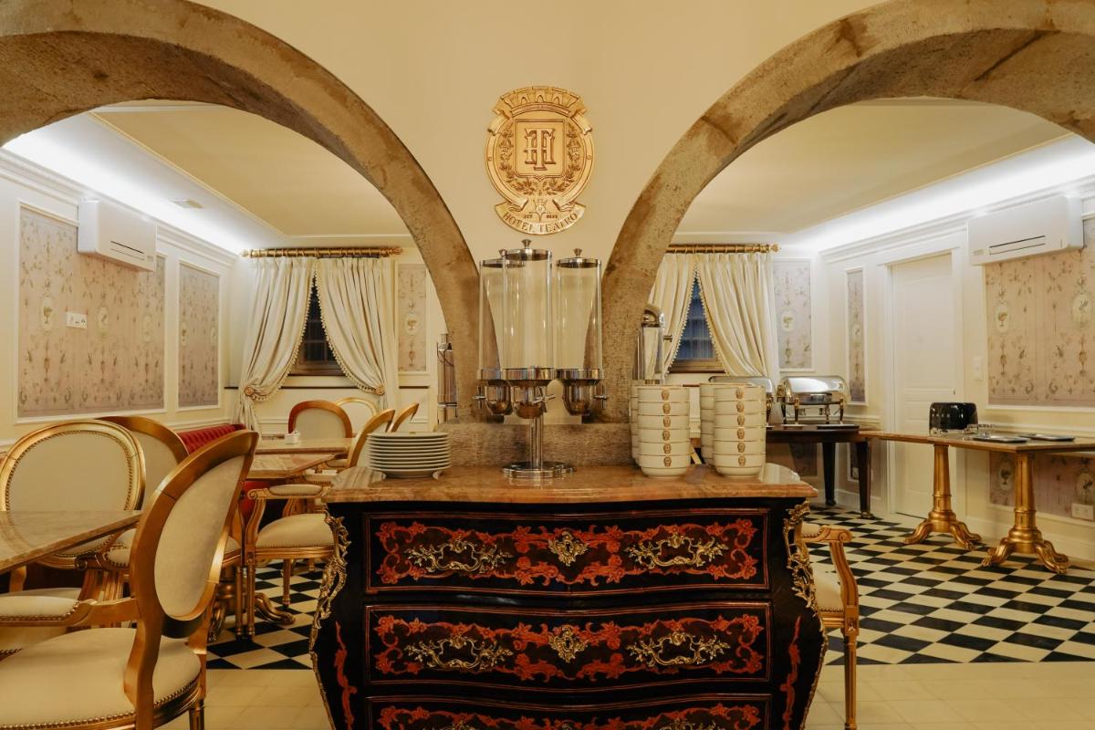 Uma área de estar em Boutique Hotel Teatro
