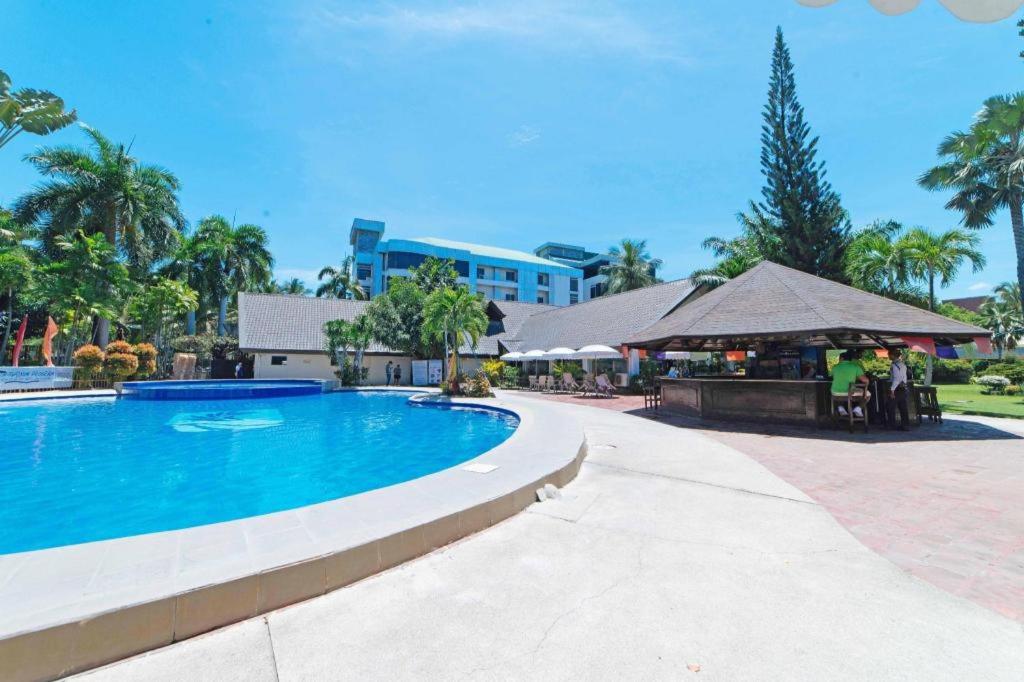 The Ritz Hotel at Garden Oases (Multiple-Use Hotel) - Housity