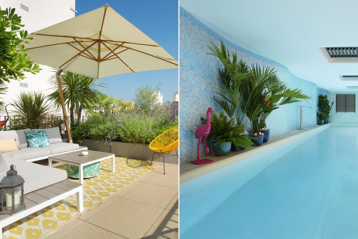 une maison avec une piscine et un patio avec une table et un parasol dans l'établissement Jardins de Mademoiselle Hôtel & Spa, à Paris