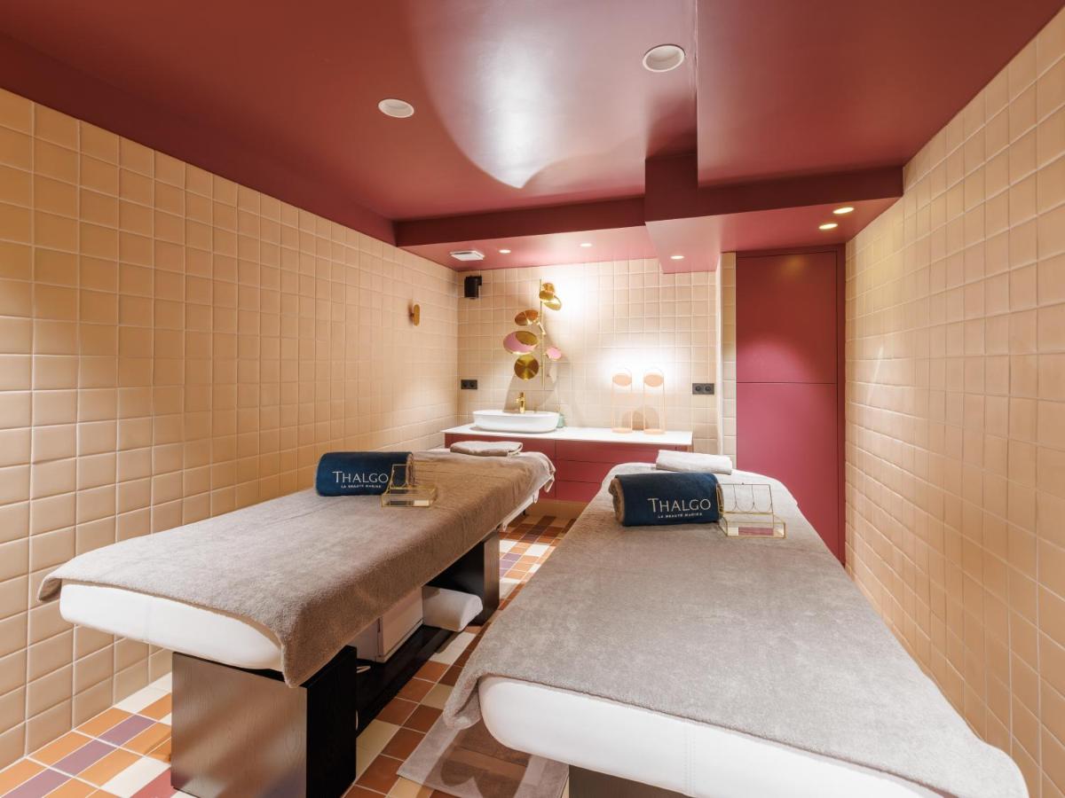 Un ou plusieurs lits dans un hébergement de l'établissement Aiden by Best Western Clermont-Ferrand Hotel & Spa