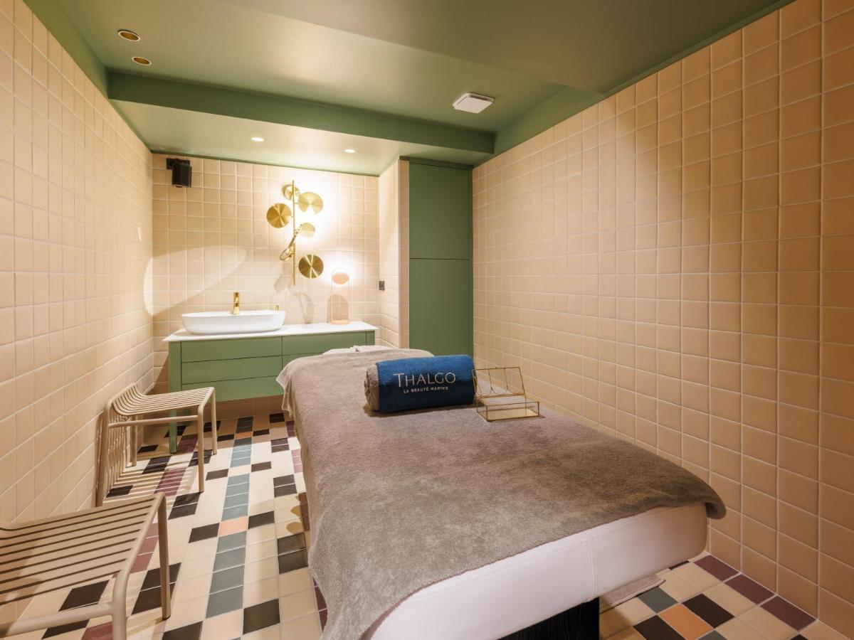 Un ou plusieurs lits dans un hébergement de l'établissement Aiden by Best Western Clermont-Ferrand Hotel & Spa