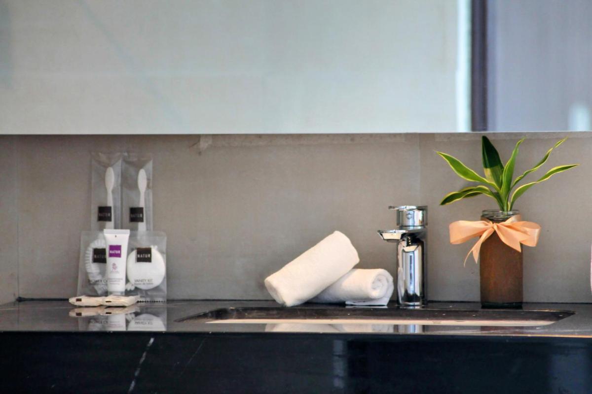 The Plaza Garden Hotel and Residences - Housity