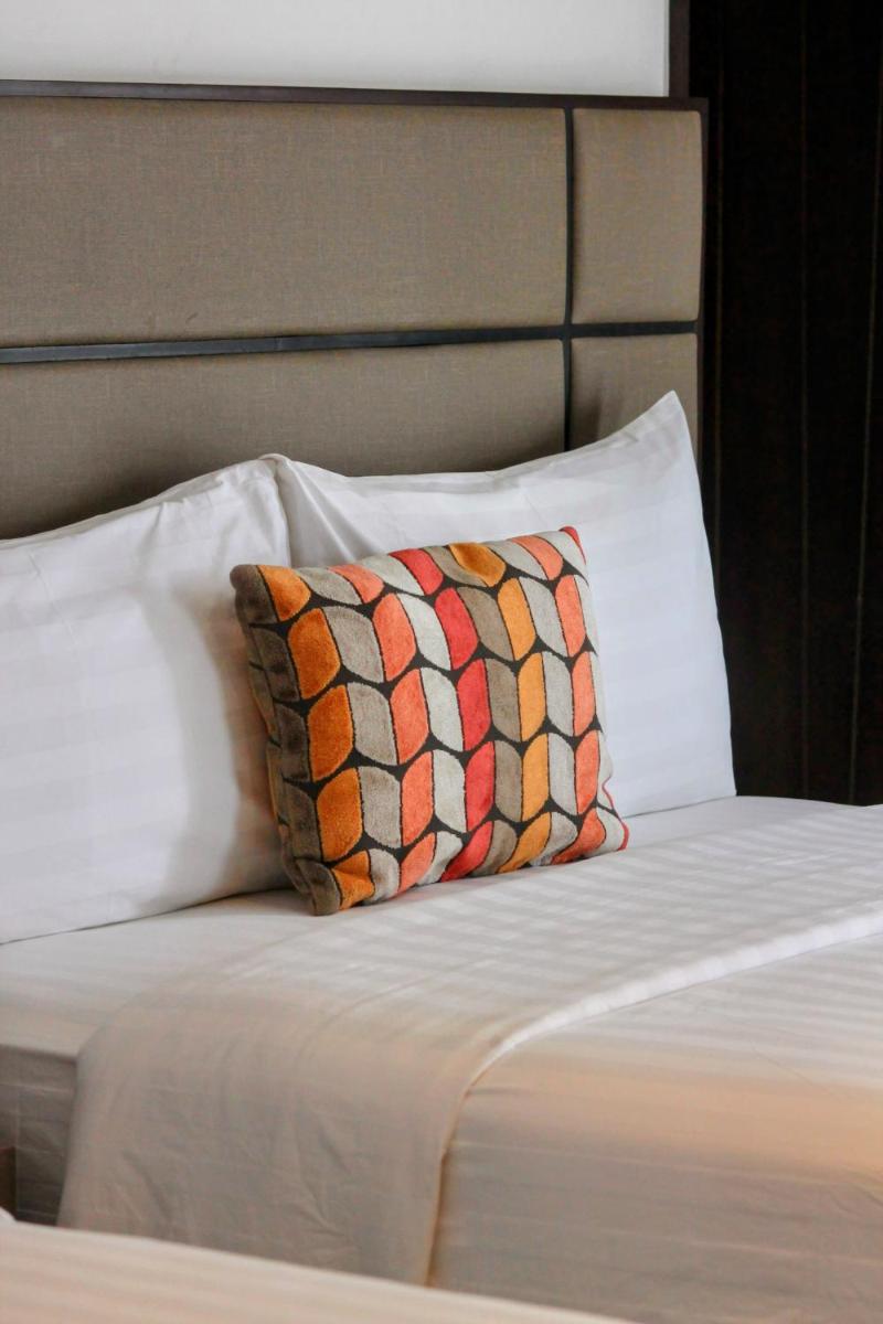 The Plaza Garden Hotel and Residences - Housity