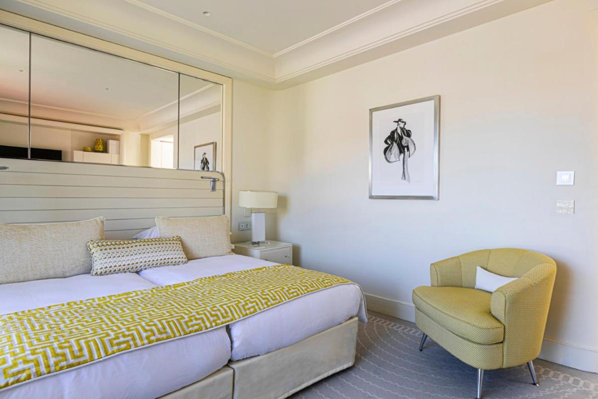 Un ou plusieurs lits dans un hébergement de l'établissement Hôtel Martinez, in The Unbound Collection by Hyatt