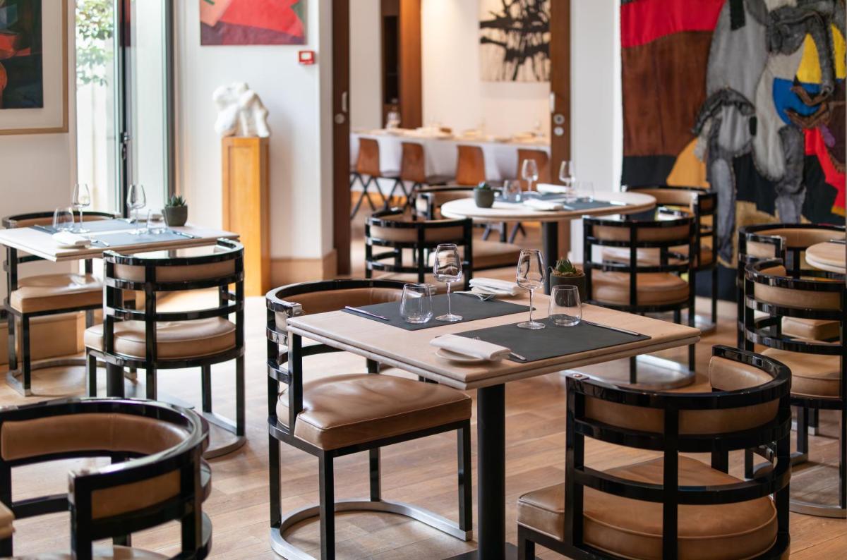 Restaurant ou autre lieu de restauration dans l'établissement Grand Hôtel Champs-Elysées