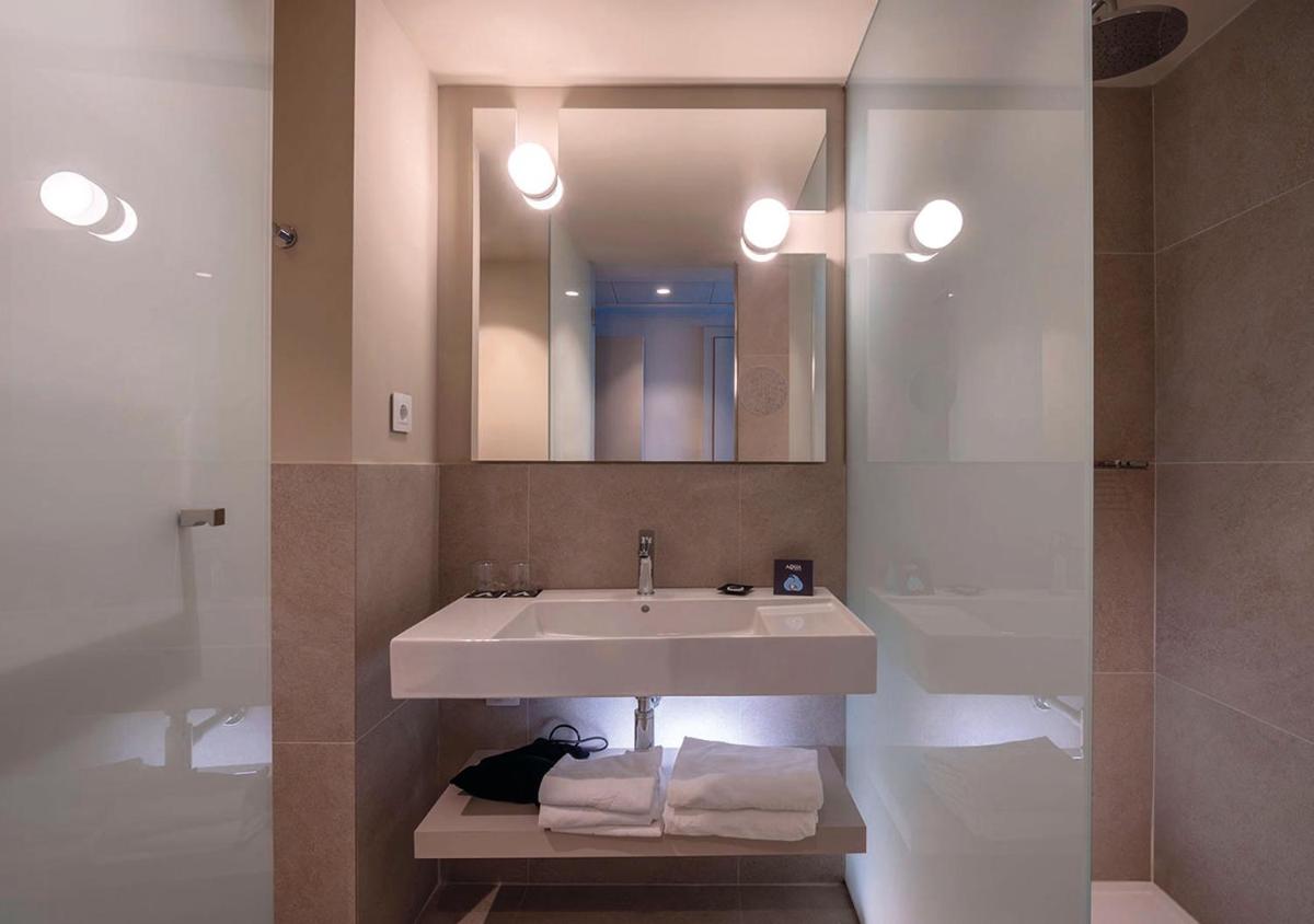 Un baño de AQUA Hotel Promenade & Spa 4Sup
