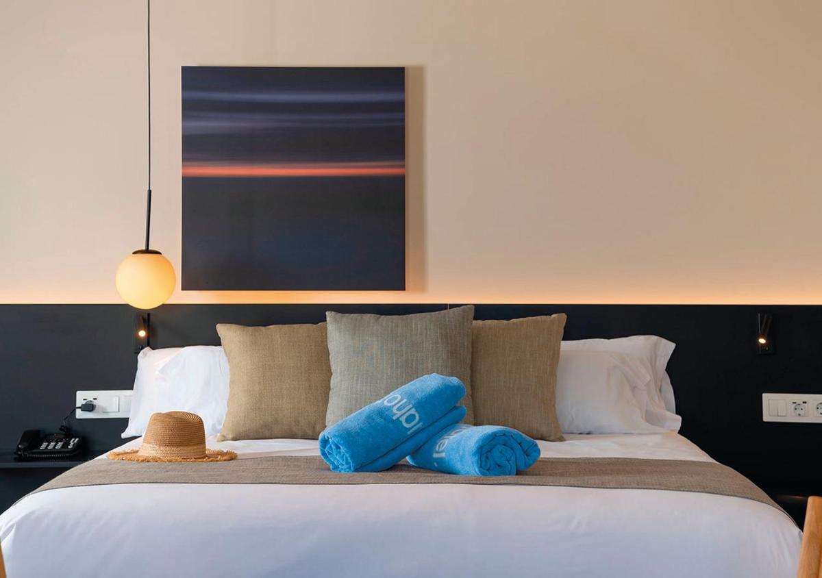 Cama o camas de una habitación en AQUA Hotel Promenade & Spa 4Sup