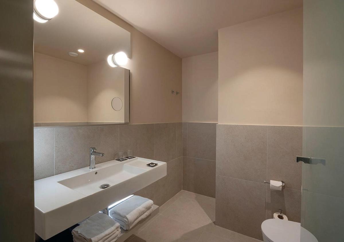 Un baño de AQUA Hotel Promenade & Spa 4Sup