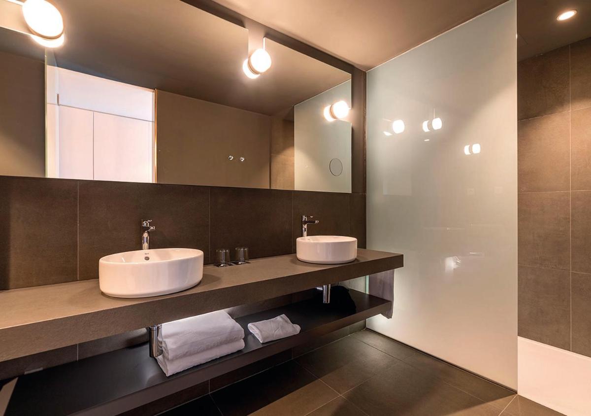 Un baño de AQUA Hotel Promenade & Spa 4Sup