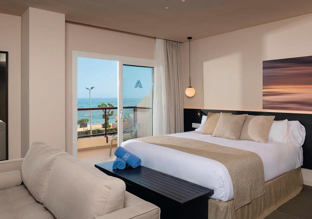 Cama o camas de una habitación en AQUA Hotel Promenade & Spa 4Sup
