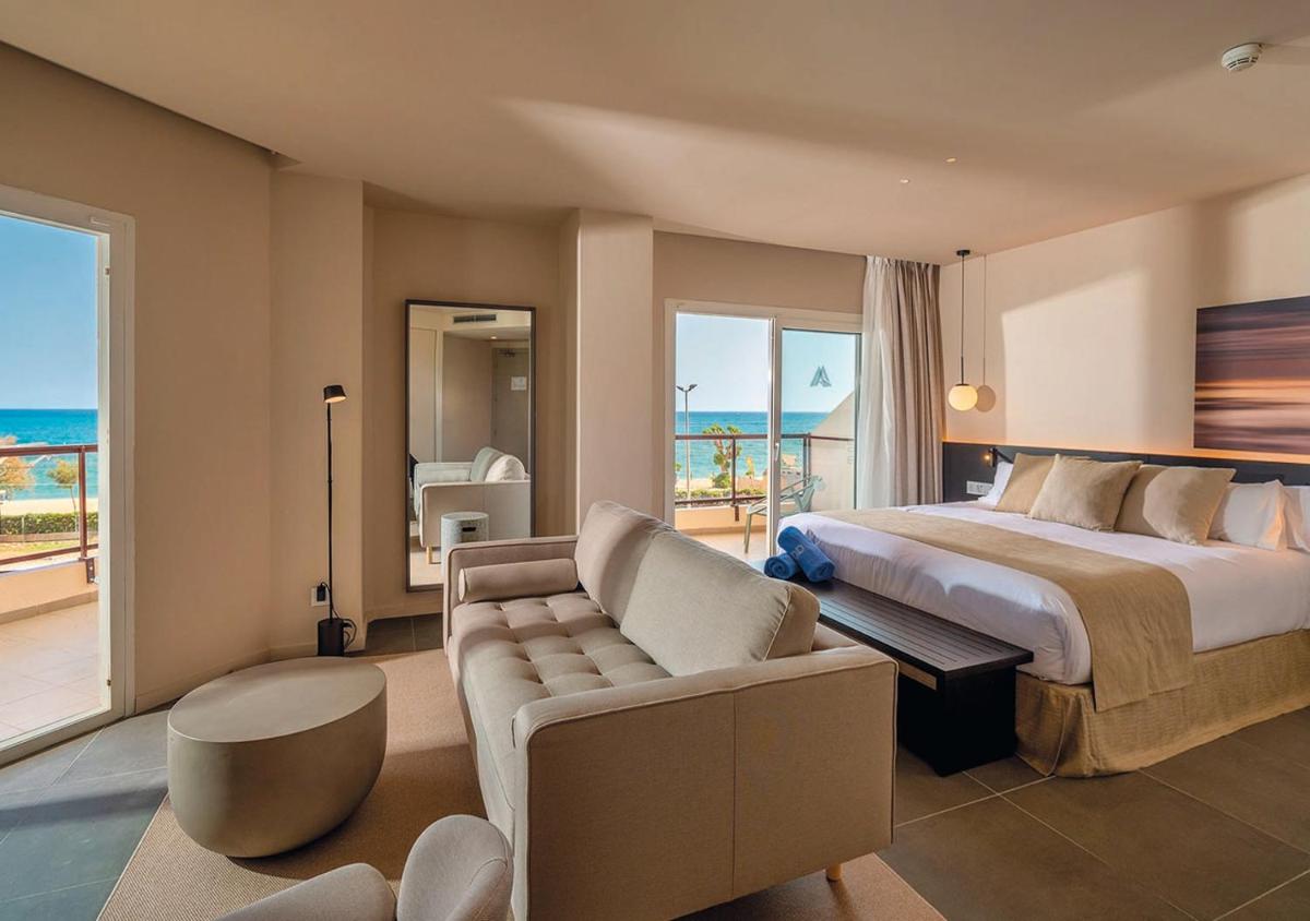 Cama o camas de una habitación en AQUA Hotel Promenade & Spa 4Sup