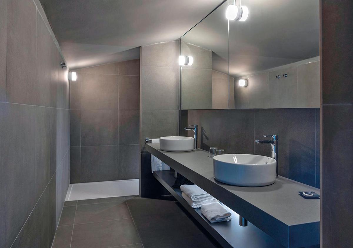 Un baño de AQUA Hotel Promenade & Spa 4Sup