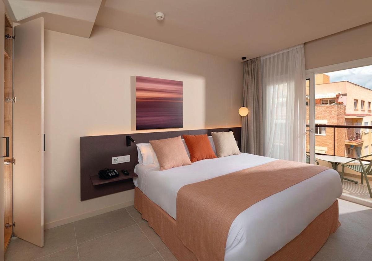 Cama o camas de una habitación en AQUA Hotel Promenade & Spa 4Sup