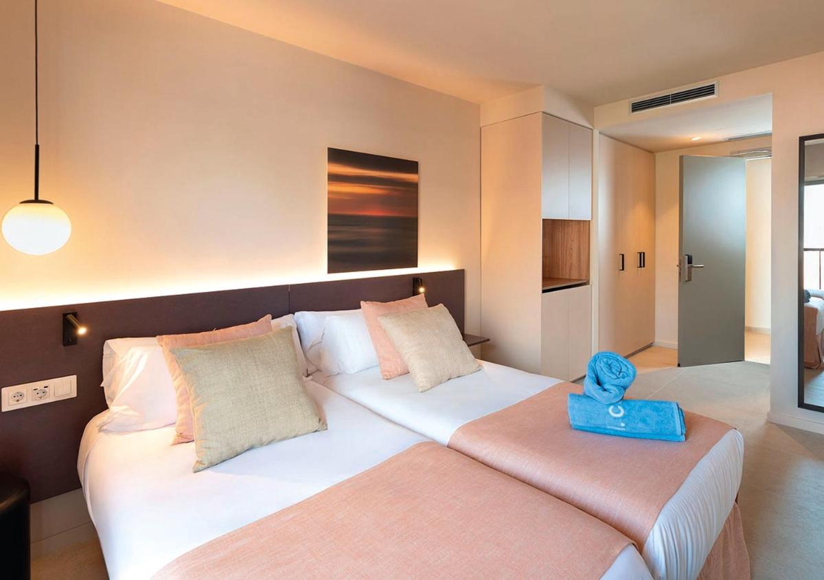 Cama o camas de una habitación en AQUA Hotel Promenade & Spa 4Sup