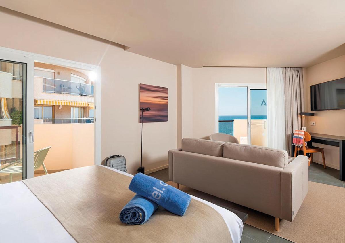 Cama o camas de una habitación en AQUA Hotel Promenade & Spa 4Sup